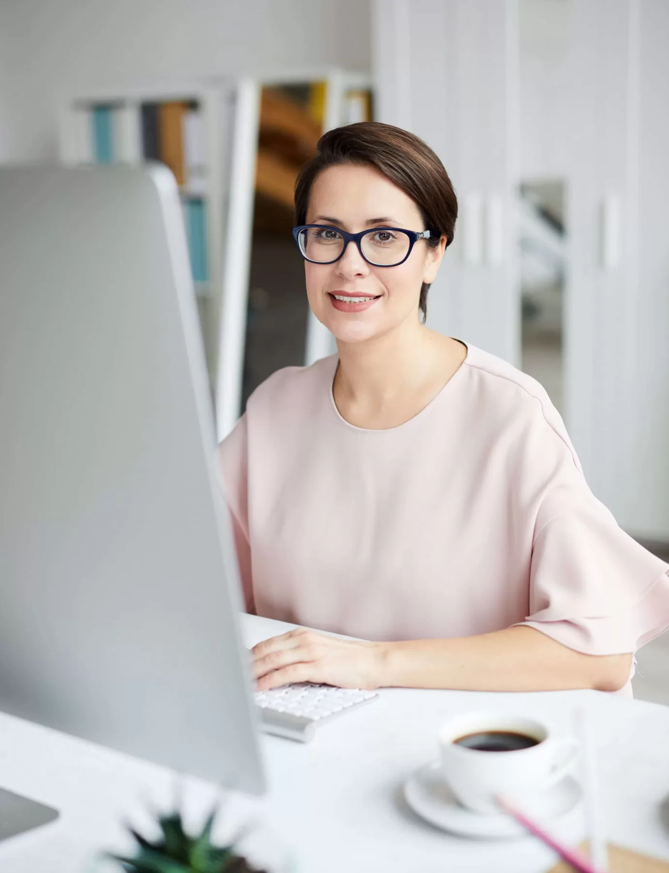 student sitting at a computer